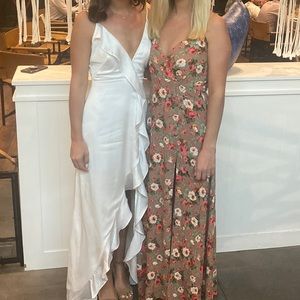 White satin high low dress. Cutout in back.